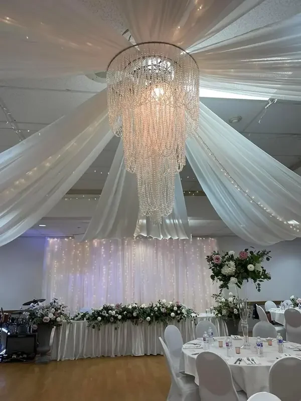 our wedding venue room setup in beautiful white drapery